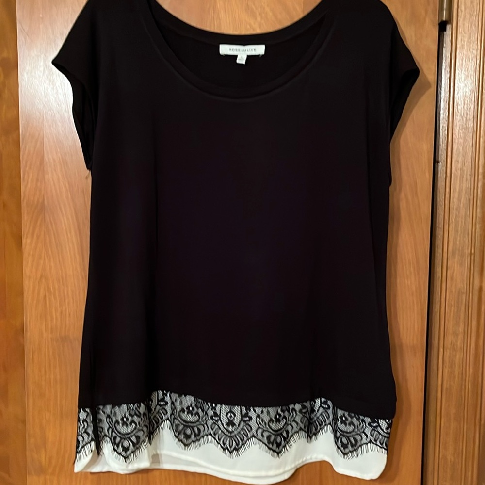 Rose & Olive Sleeveless black with cream under lace.